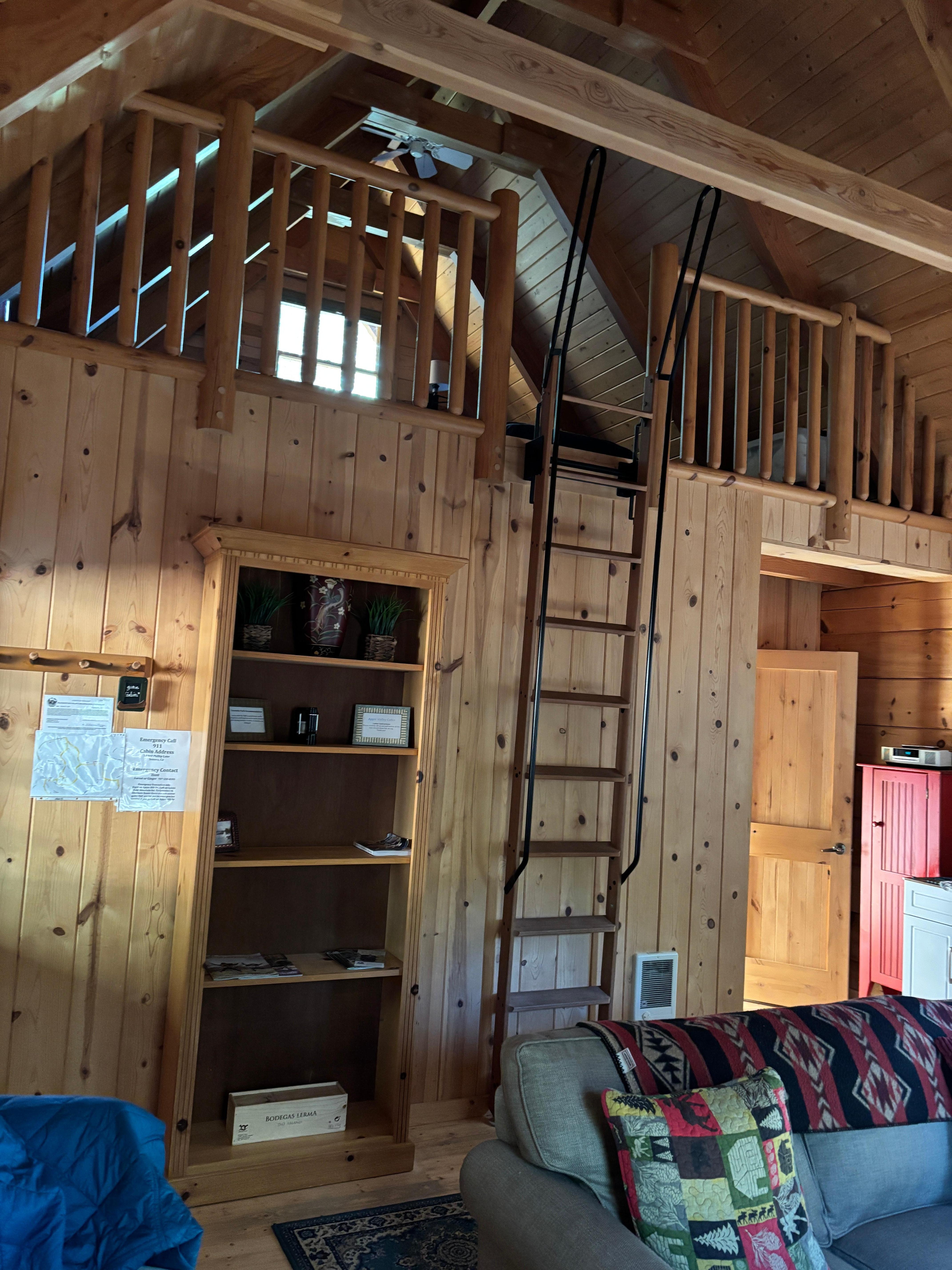 Ladder to loft. Pulls out and may stay in place.