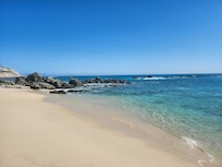 Beach just down the hill from suite