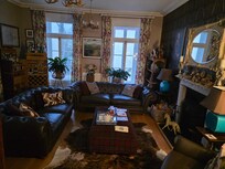 Lounge, with books, games, cards etc. Honesty bar.