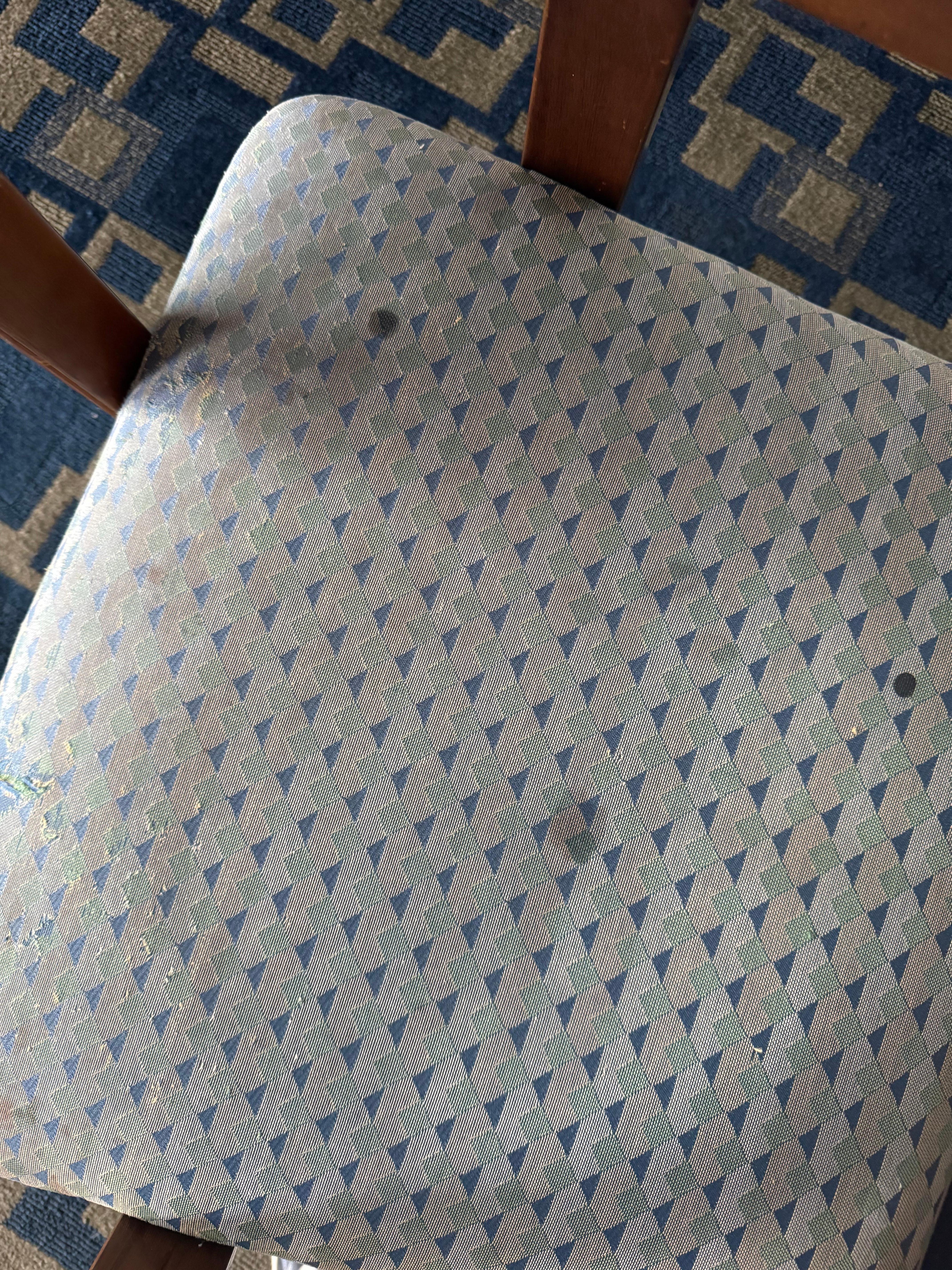 This is one of the chairs that was at the small table. 