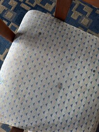 This is one of the chairs that was at the small table.