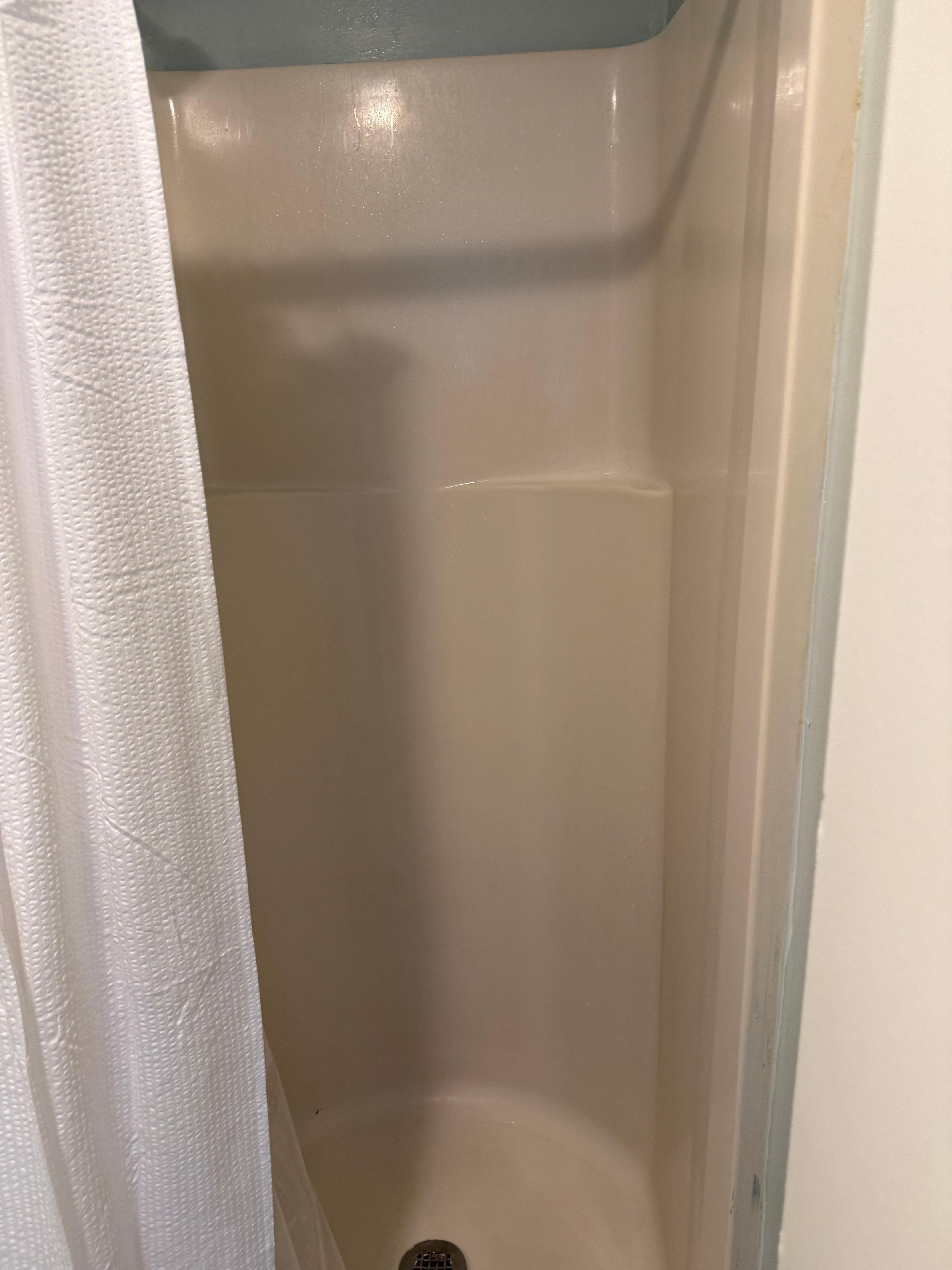Primary bathroom shower is very small.