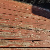 Rooftop deck showing holes, wear shoes or socks