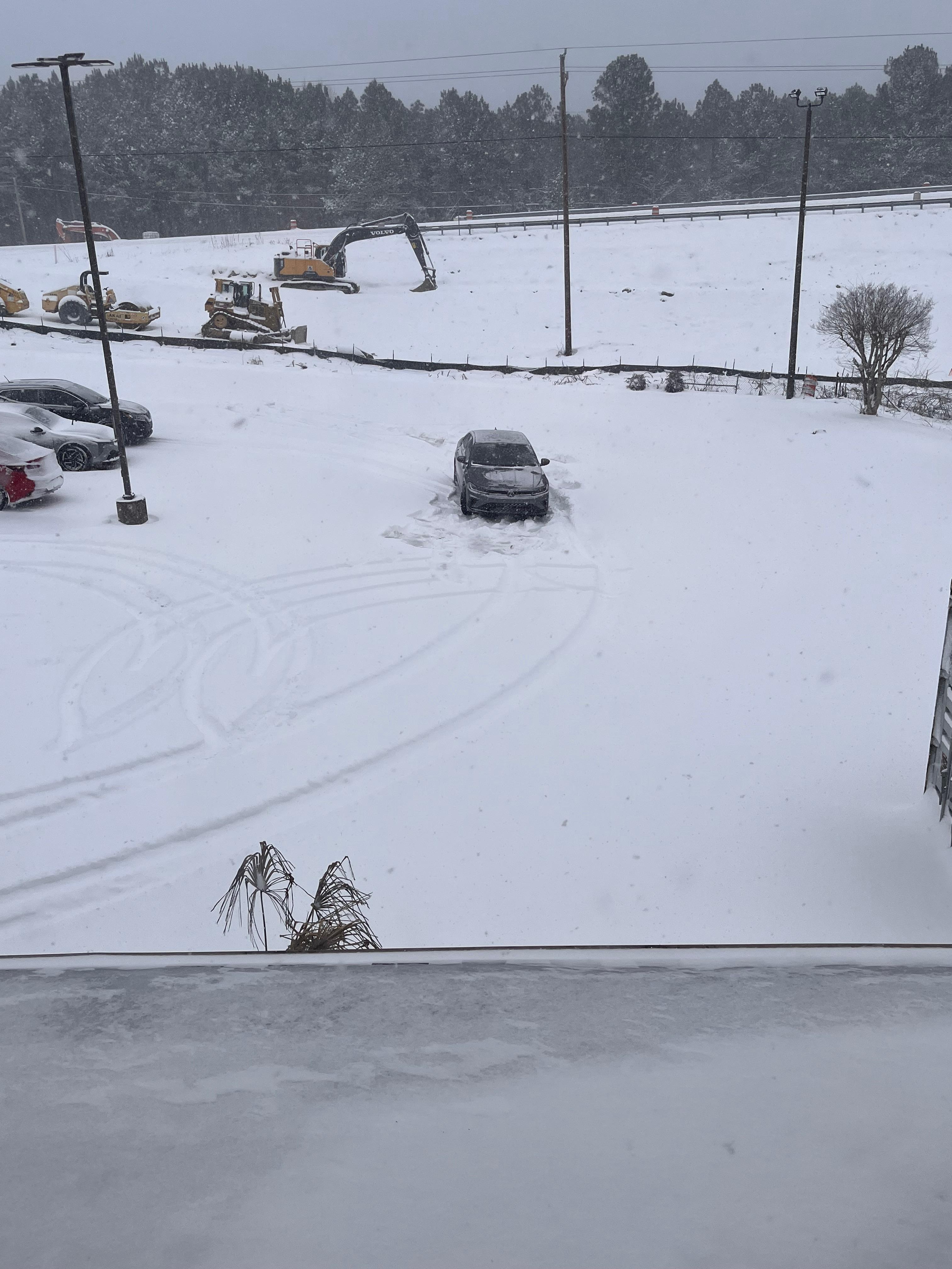 Rental car stuck in parking lot of hotel. Definitely don’t stay there if inclement weather is coming as they do not plow