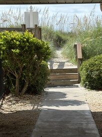 Walk out path to beach from condo bldg