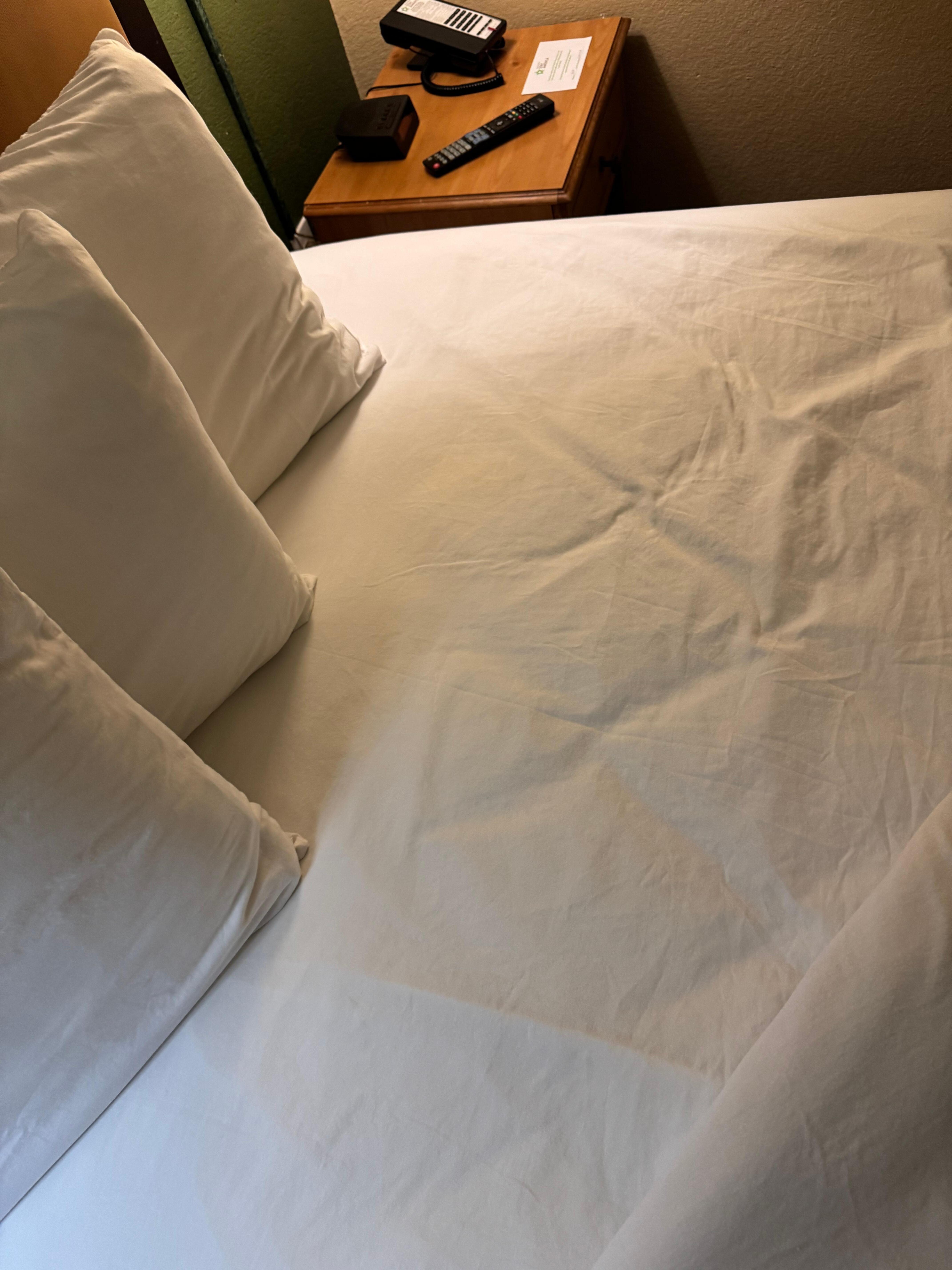 Hard Mattress with Plastic under sheet