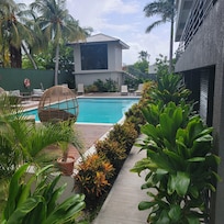 A beautiful relaxing pool with room view.