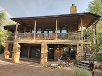 Front of home. Stairs on right to main level.