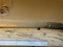 Dirty window sills with dead flies