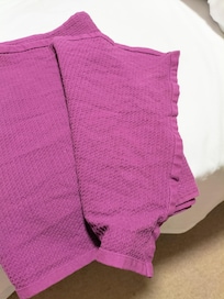 Unironed bed runner.