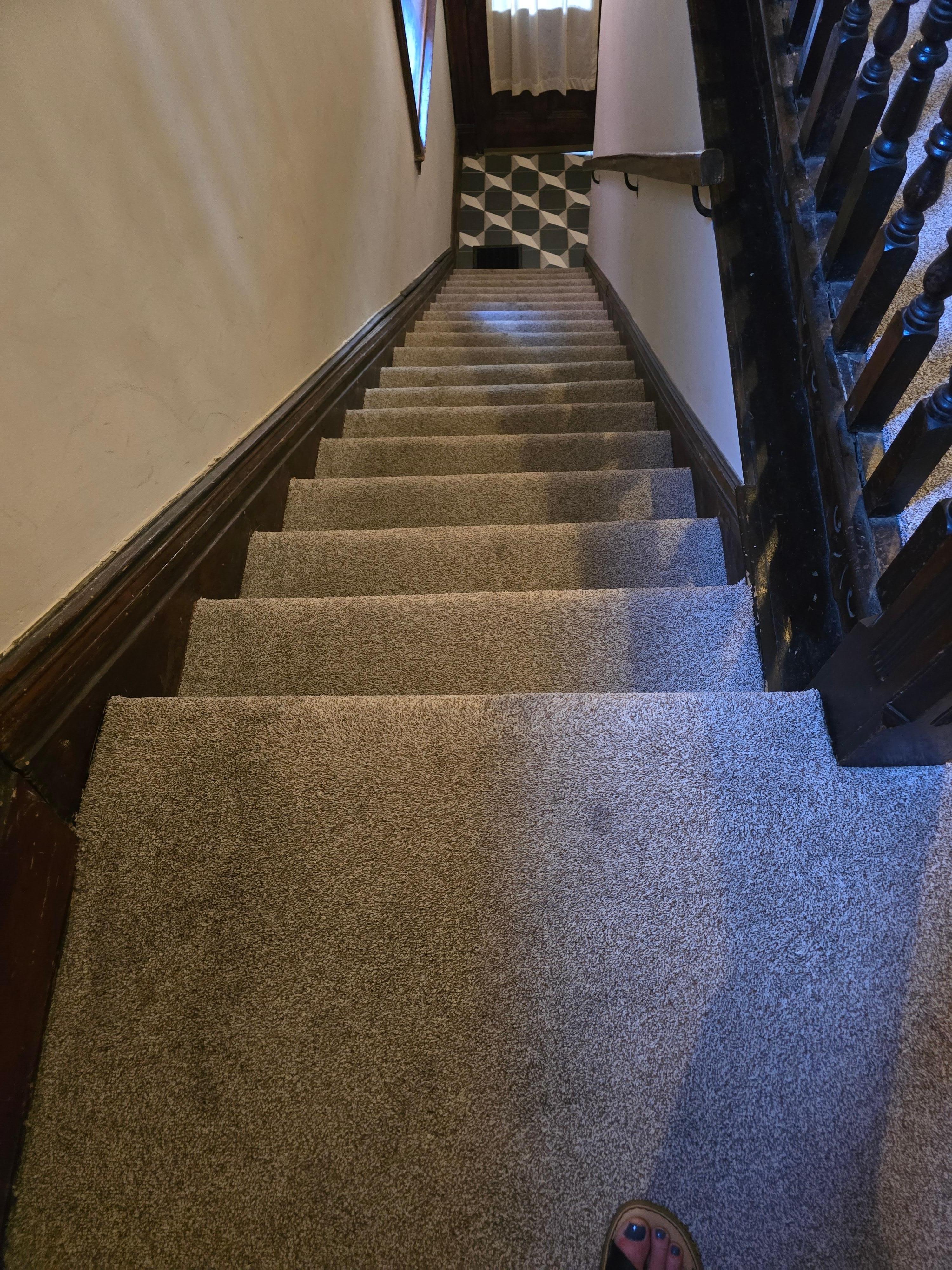 Stairs to main level (entry)