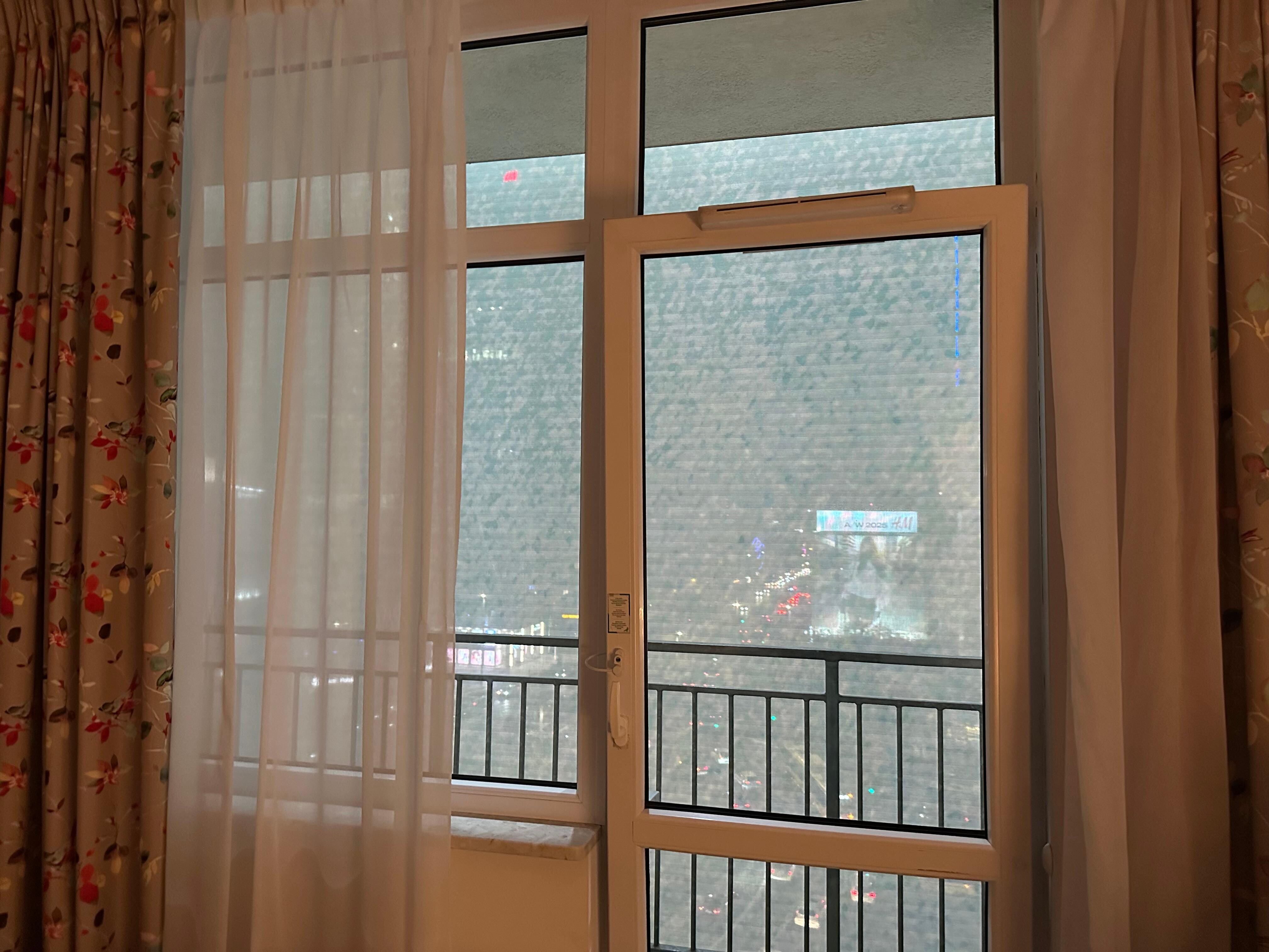 Our room at night with blaring advert lights