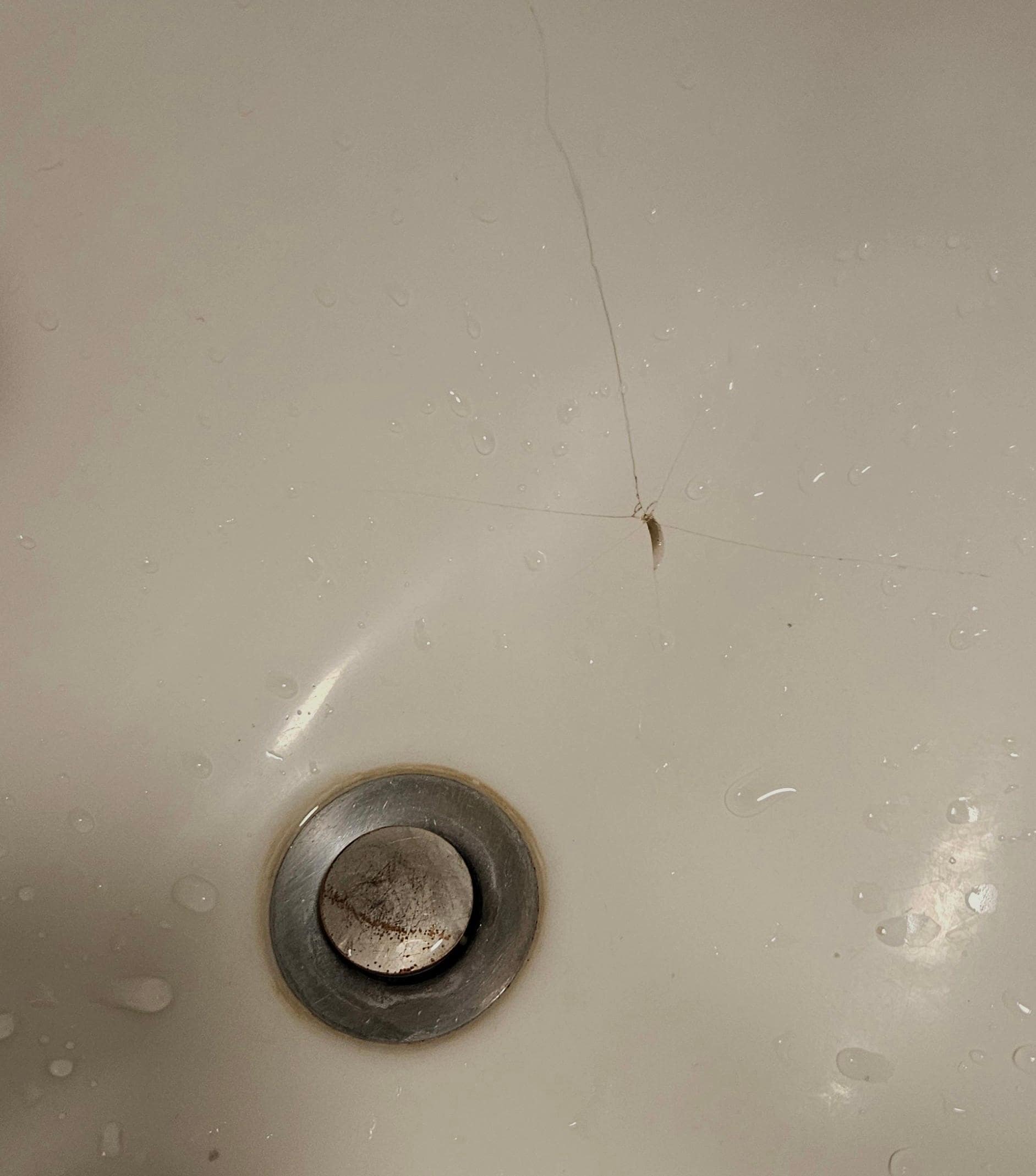 Bathroom.sink stained and cracked