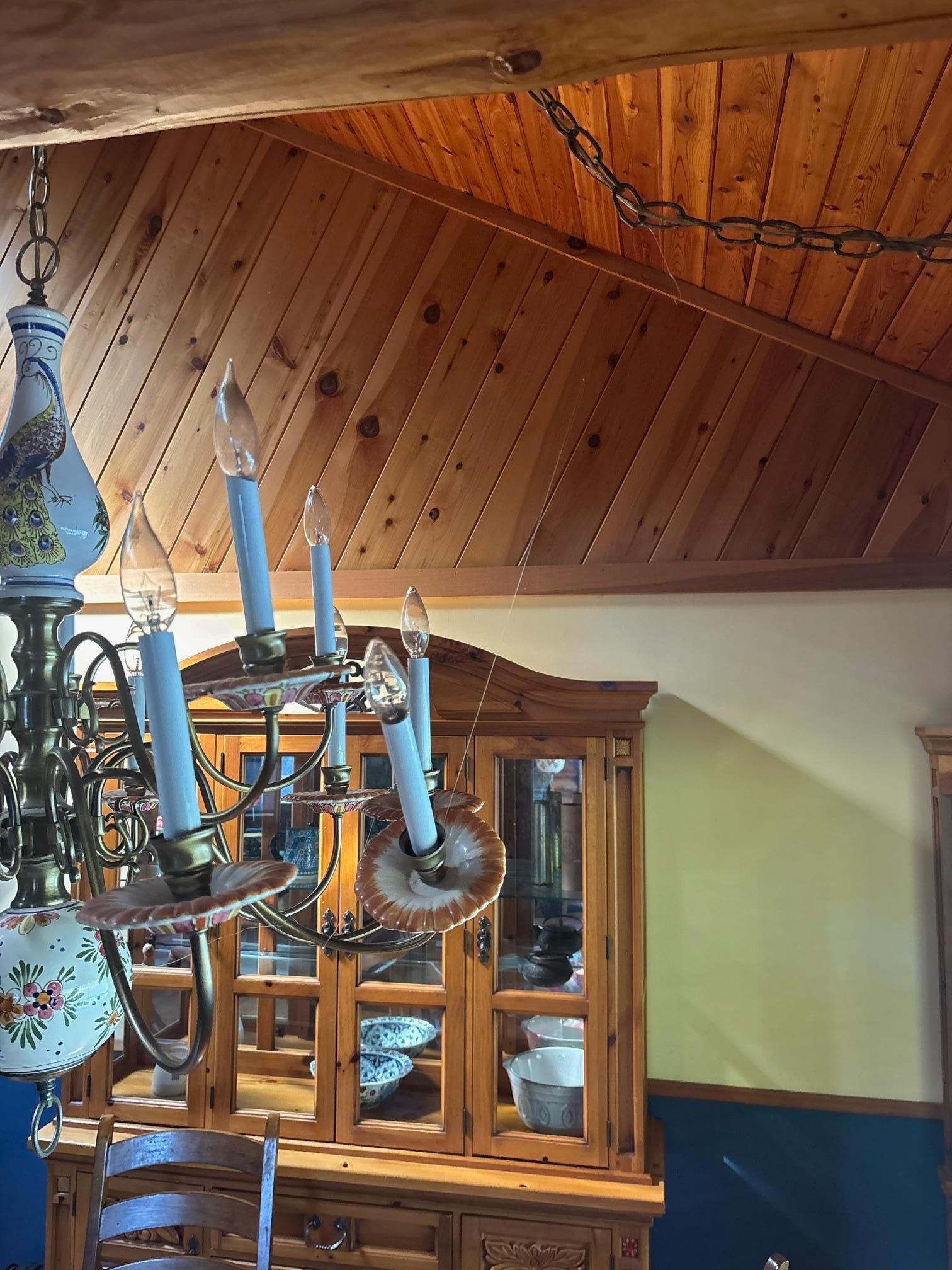 Fishing line attempting to hold the chandelier together