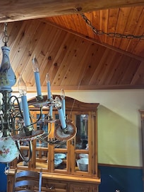 Fishing line attempting to hold the chandelier together