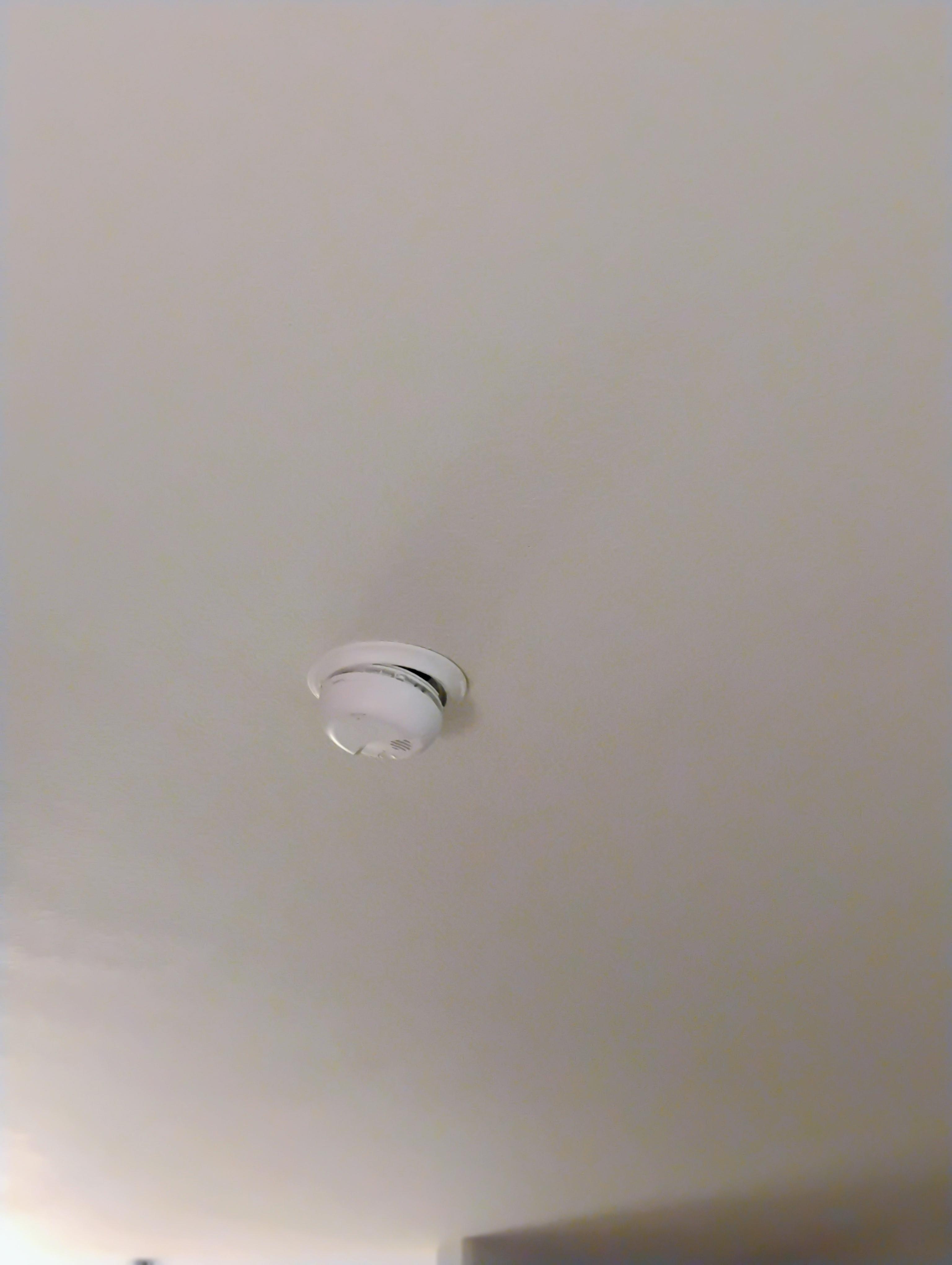 Smoke detector that wasn't correctly installed and was ajar.