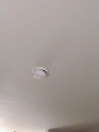 Smoke detector that wasn't correctly installed and was ajar.