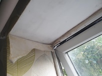 Peeling wallpaper and damp