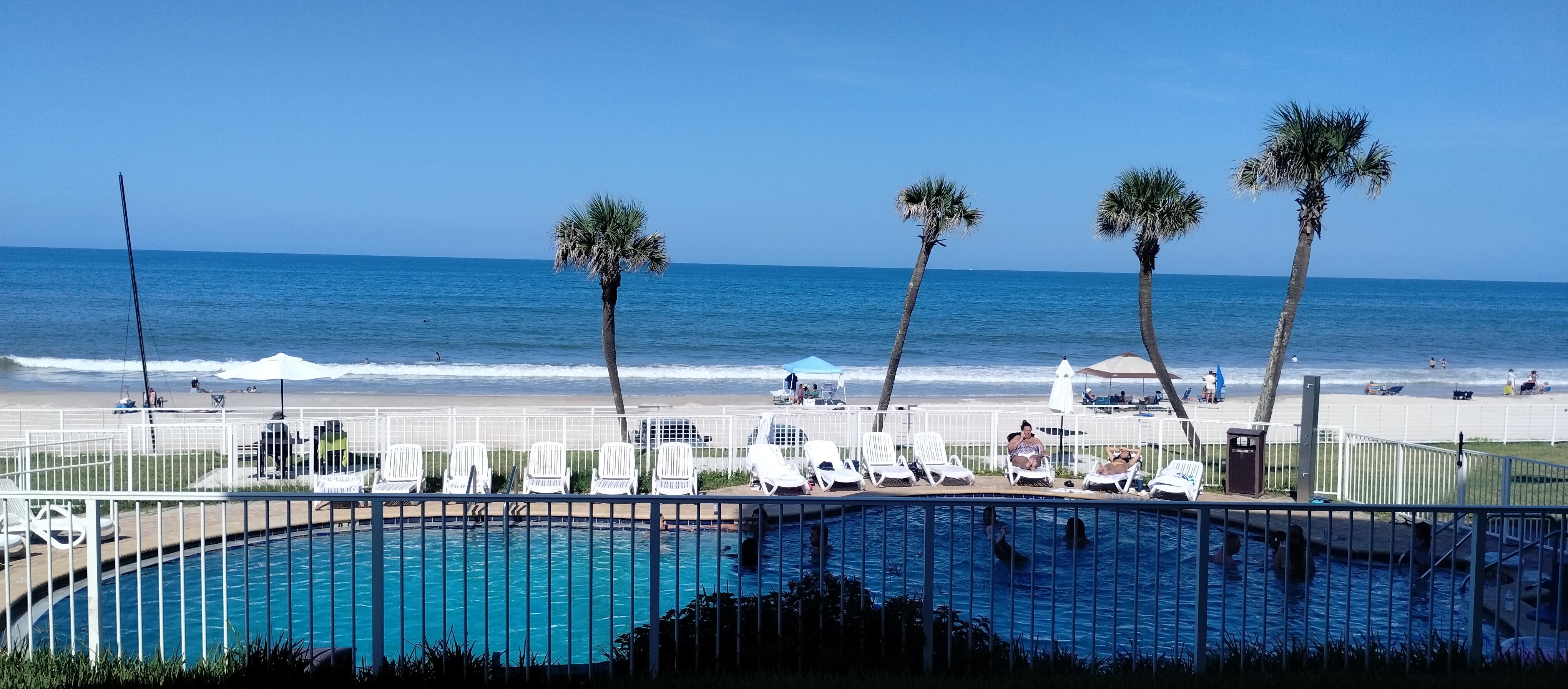View of pool and beach from patio 