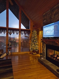 The cabin is so nice, with nice big windows, a fireplace, and beautiful views.