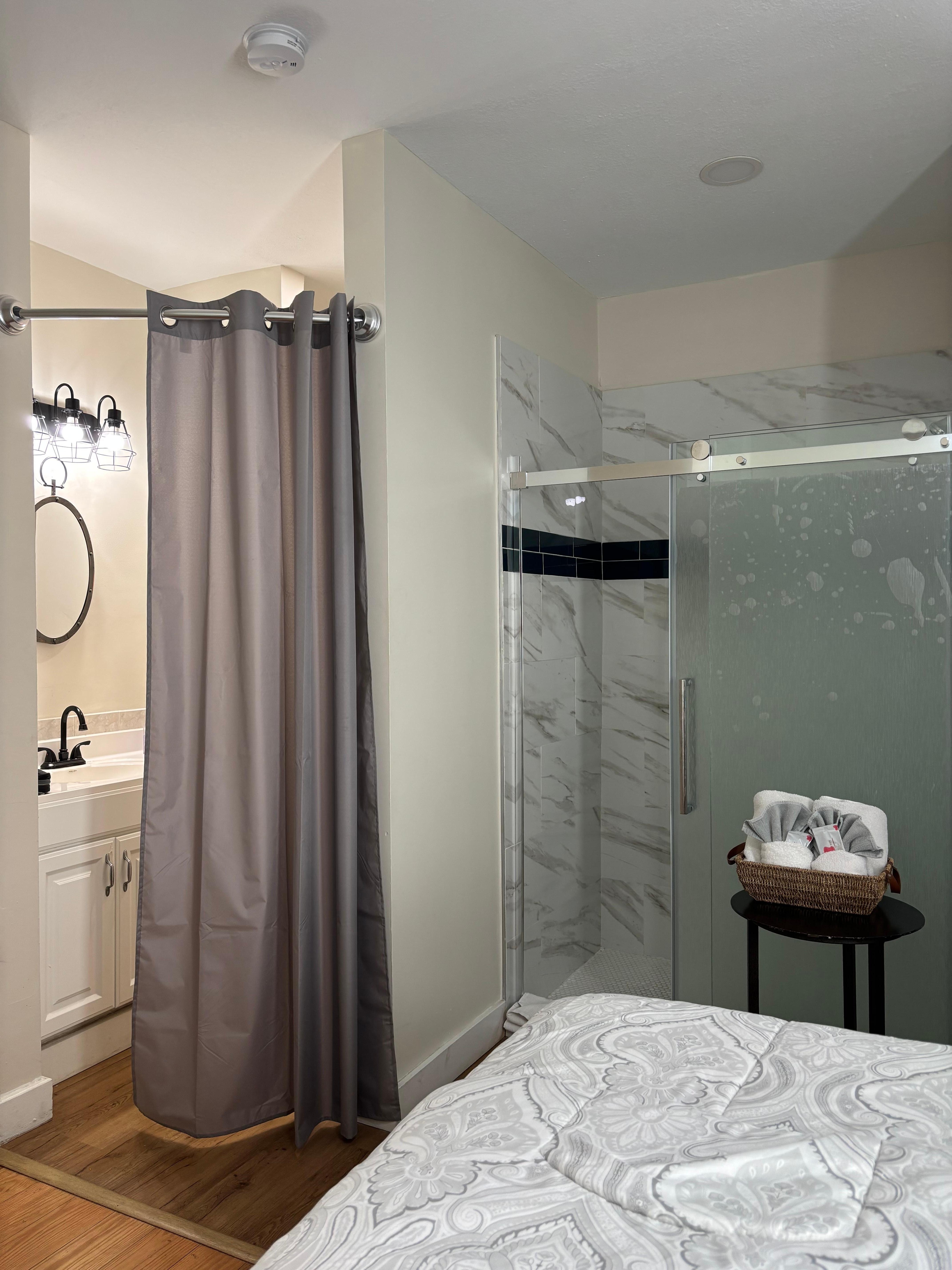 Shower was nice, there is just no separation from the bed area.