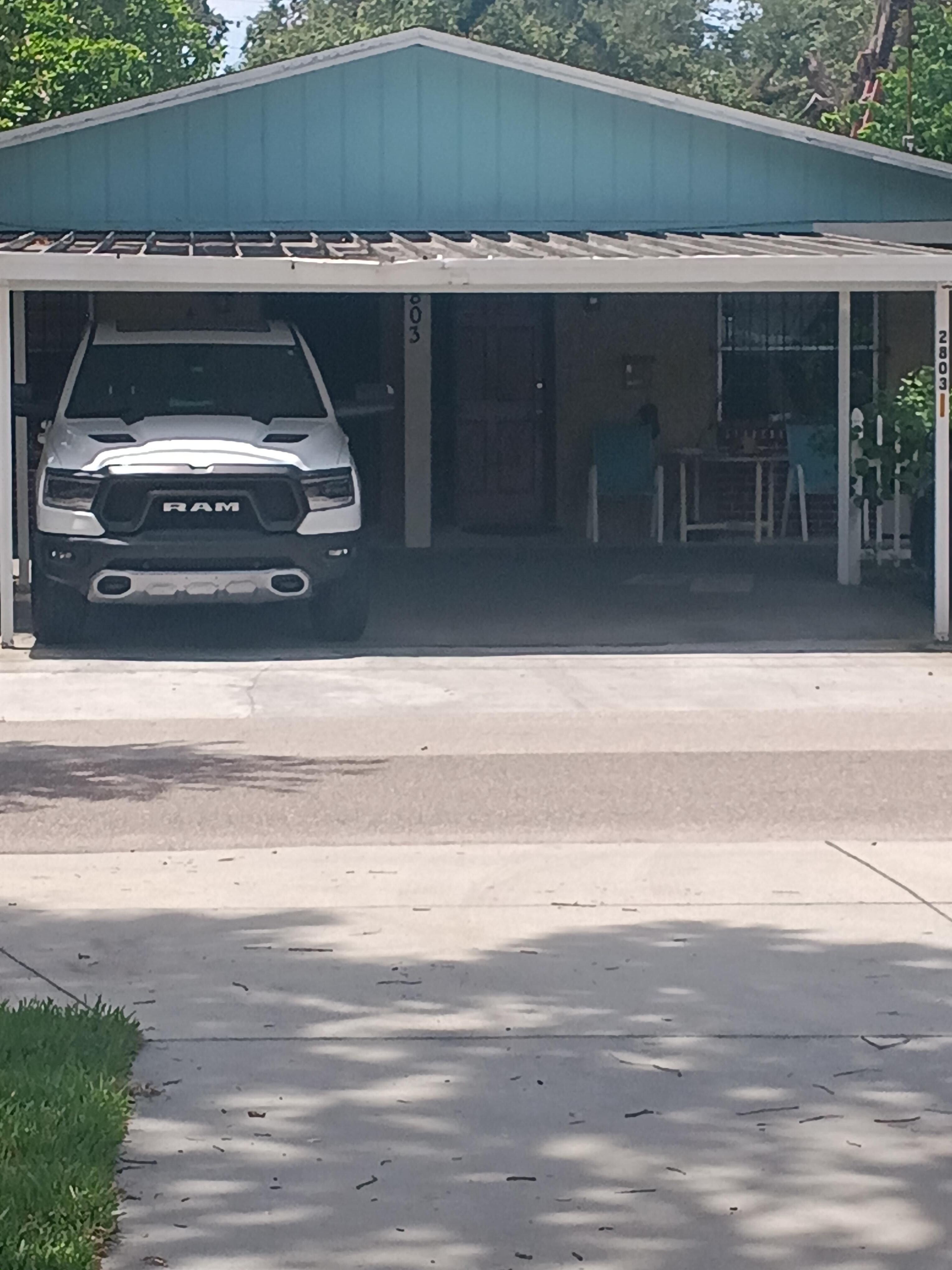 House with bars across street