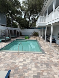 Pool area.. mostly dirty.