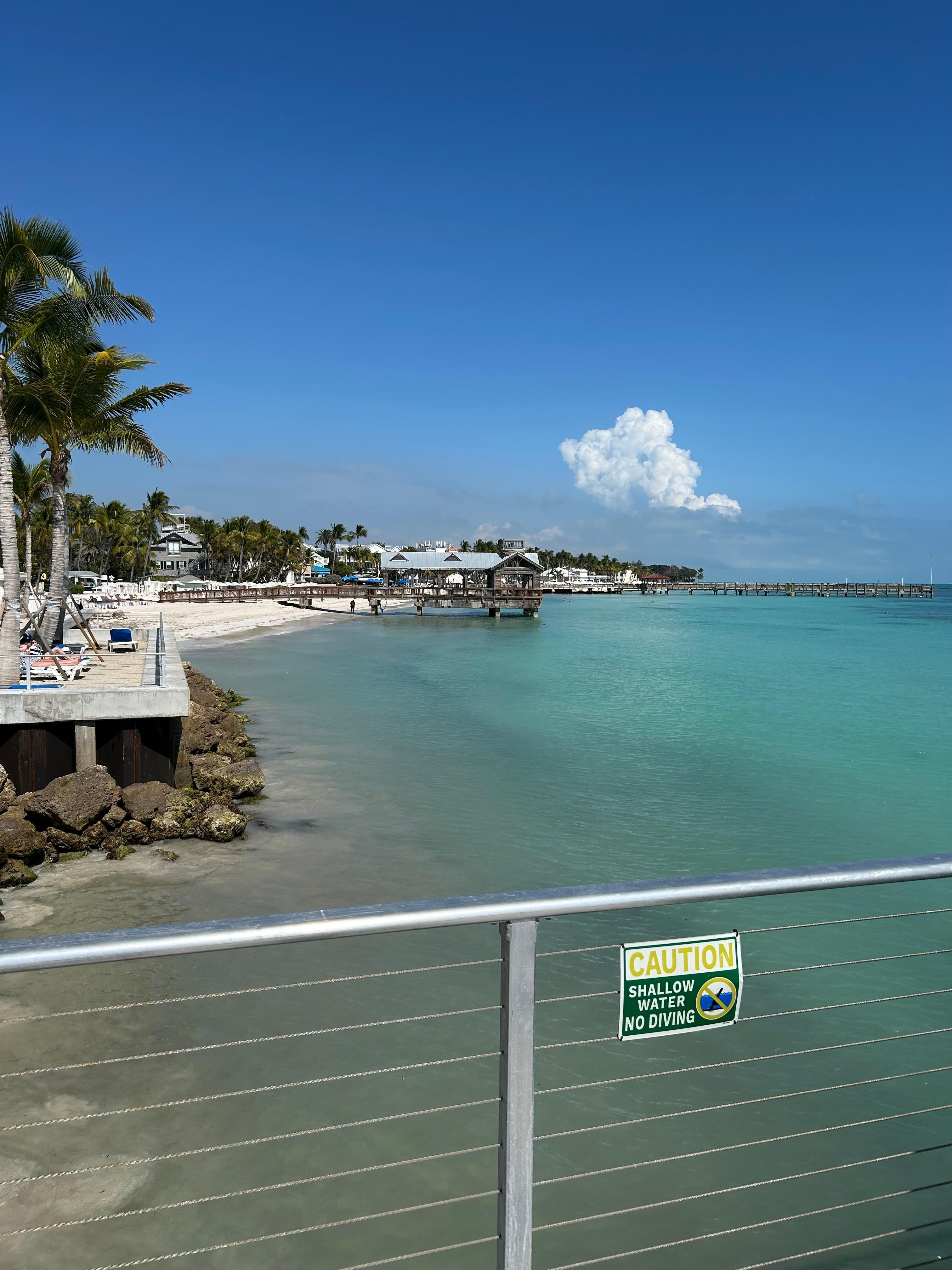 Private pier for lounging under large umbrellas or fishing.