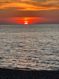Tunnel Beach at sunset.