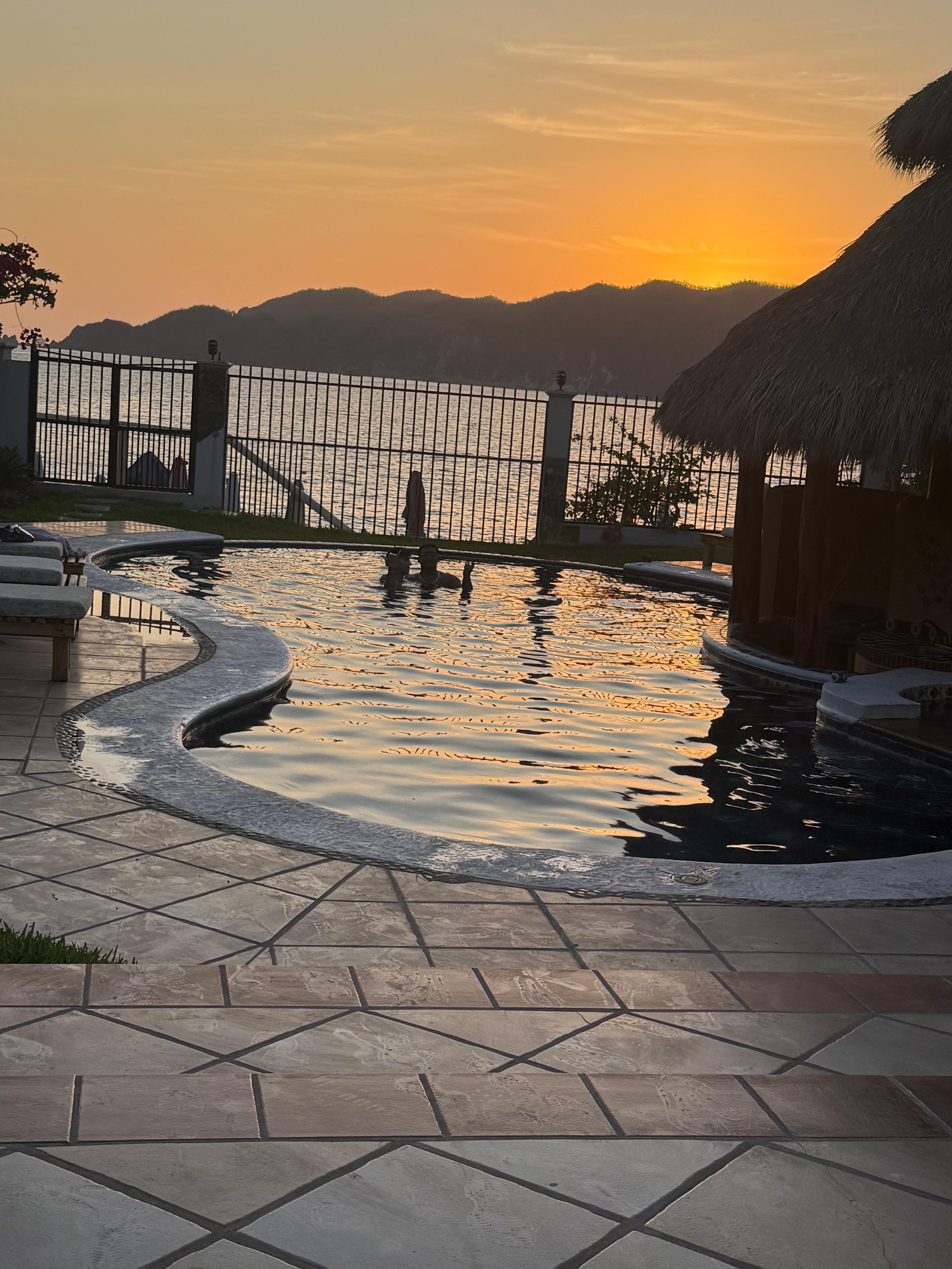 Enjoying the sunset and the pool!!