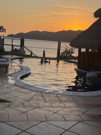 Enjoying the sunset and the pool!!