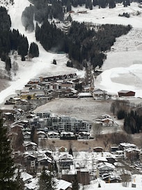 View of the house, right where slope on the right side makes a U. Slope # 78 if you look up the trail map.
