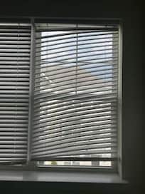 Broken blinds in one of the bedrooms