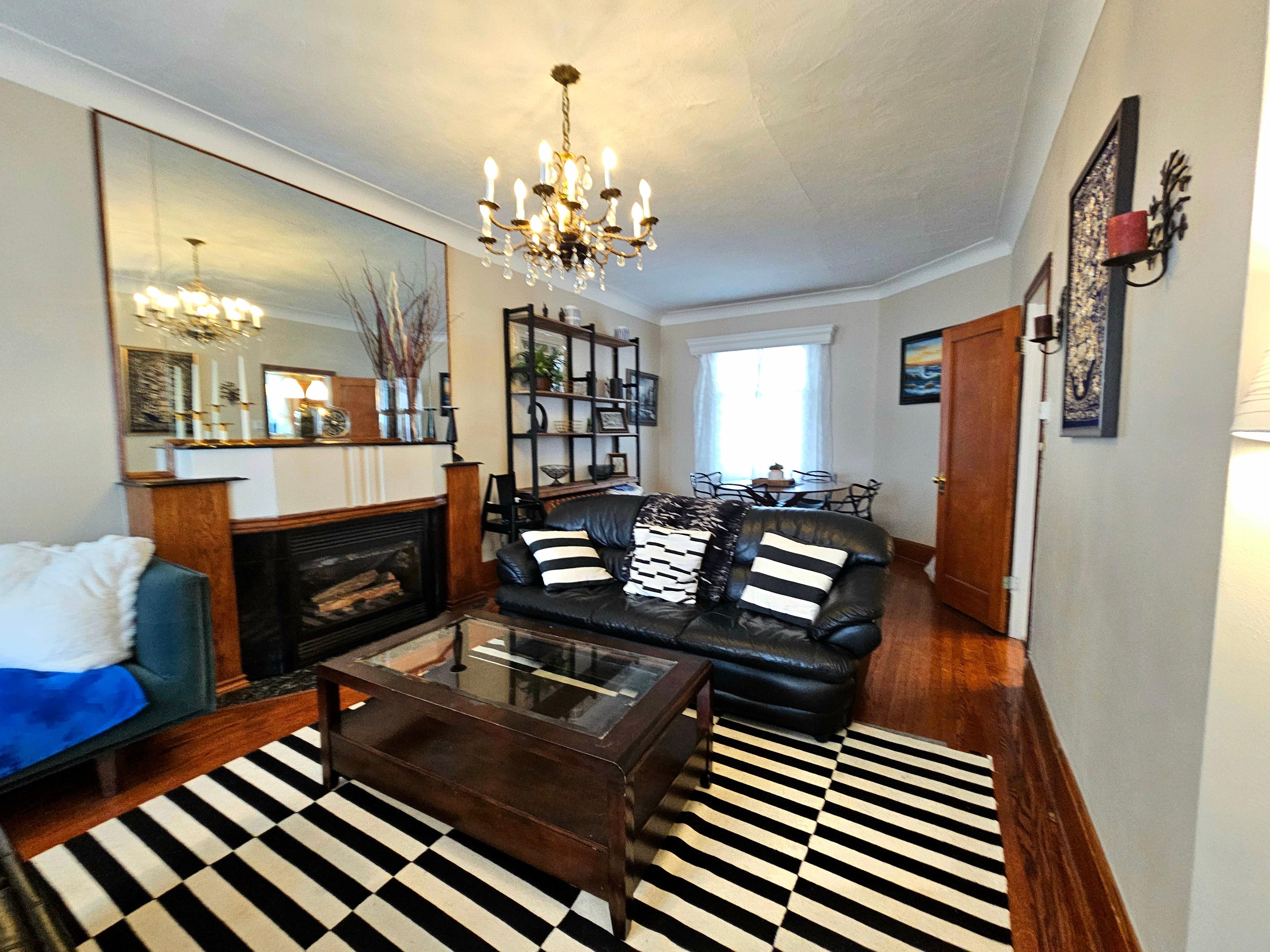 Dining table in the back with extra seating and high chair