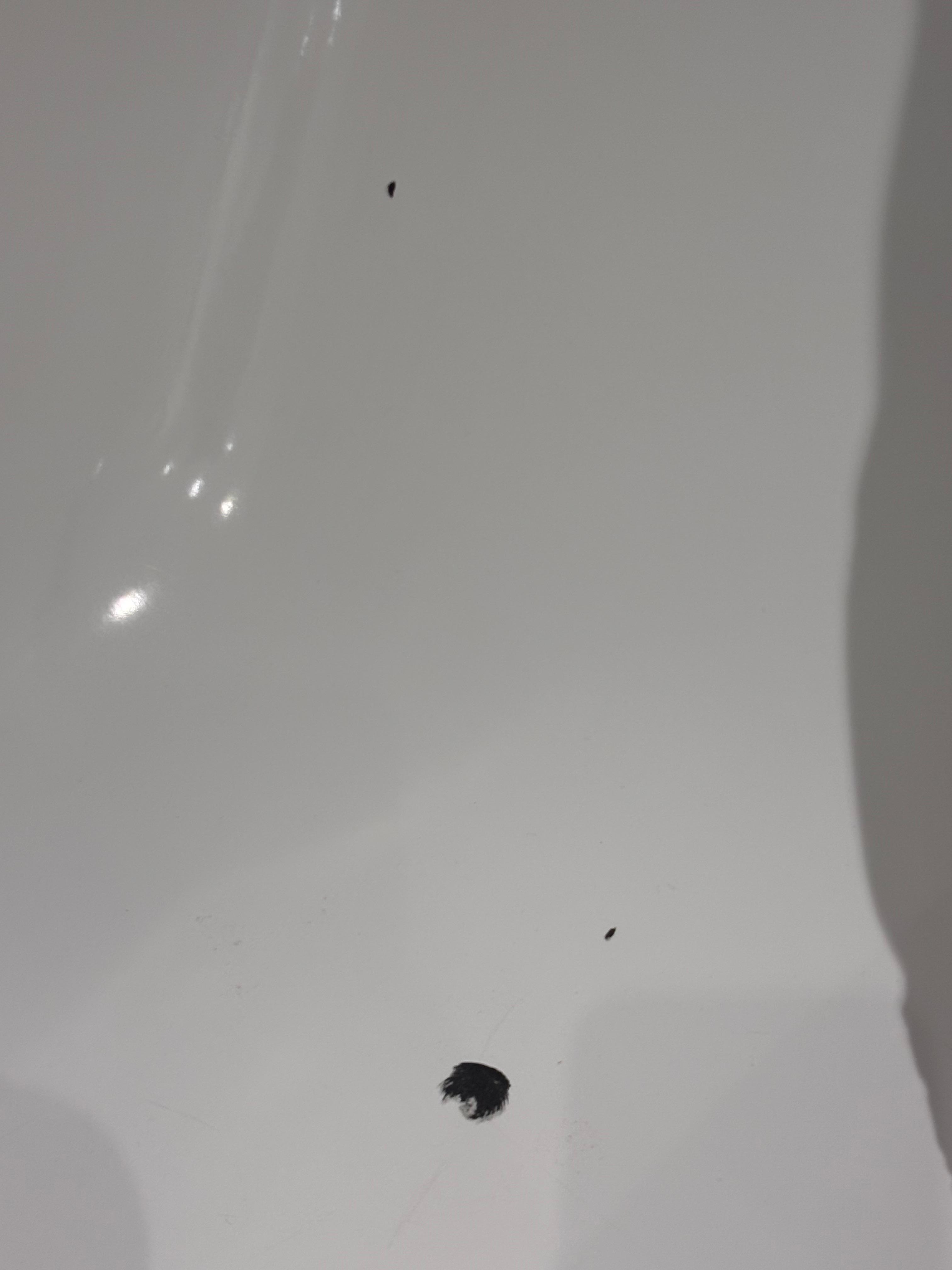 Cracks and chips and marks on the bath 