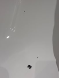 Cracks and chips and marks on the bath