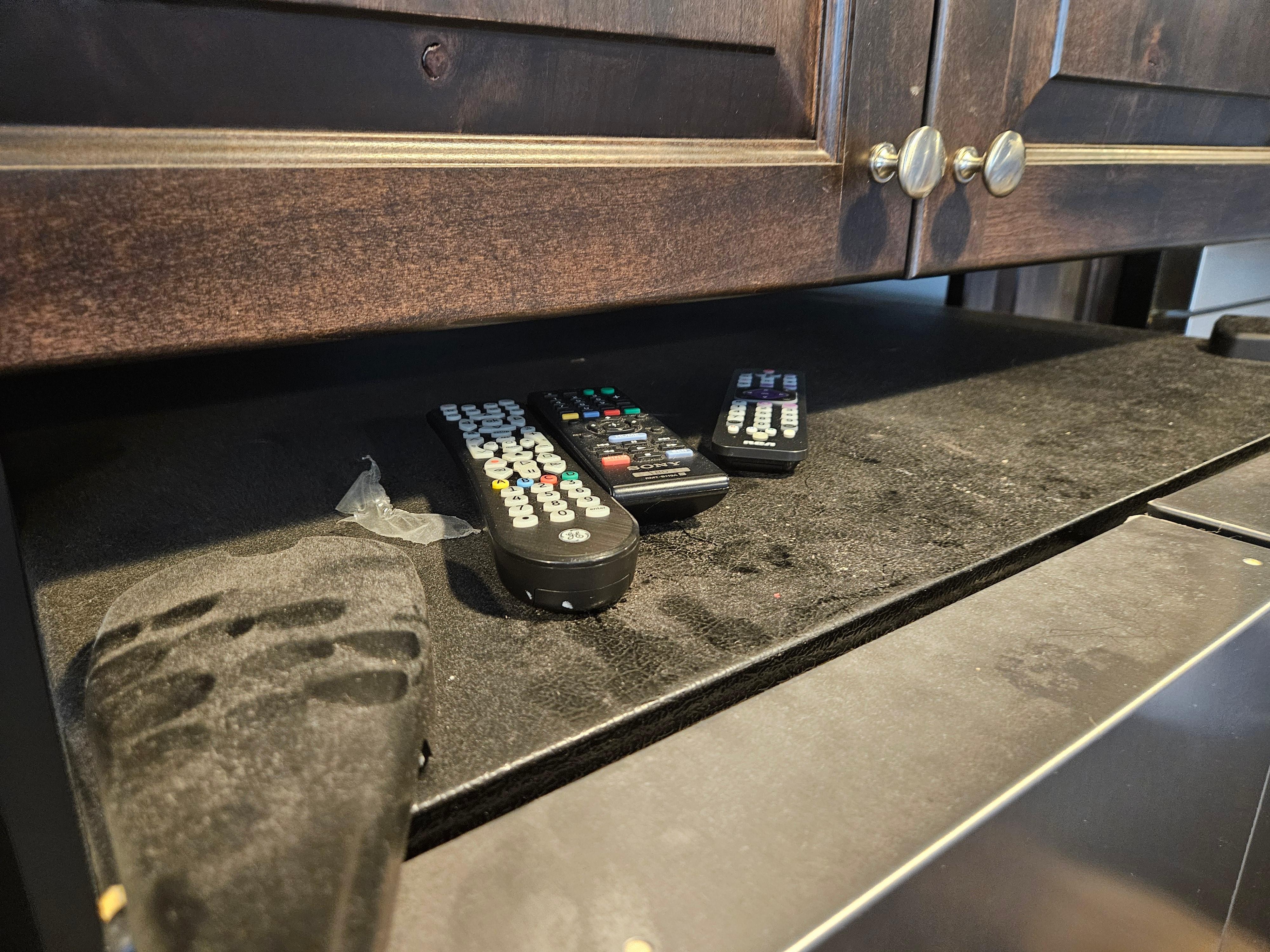 Dirt on top of fridge