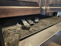 Dirt on top of fridge