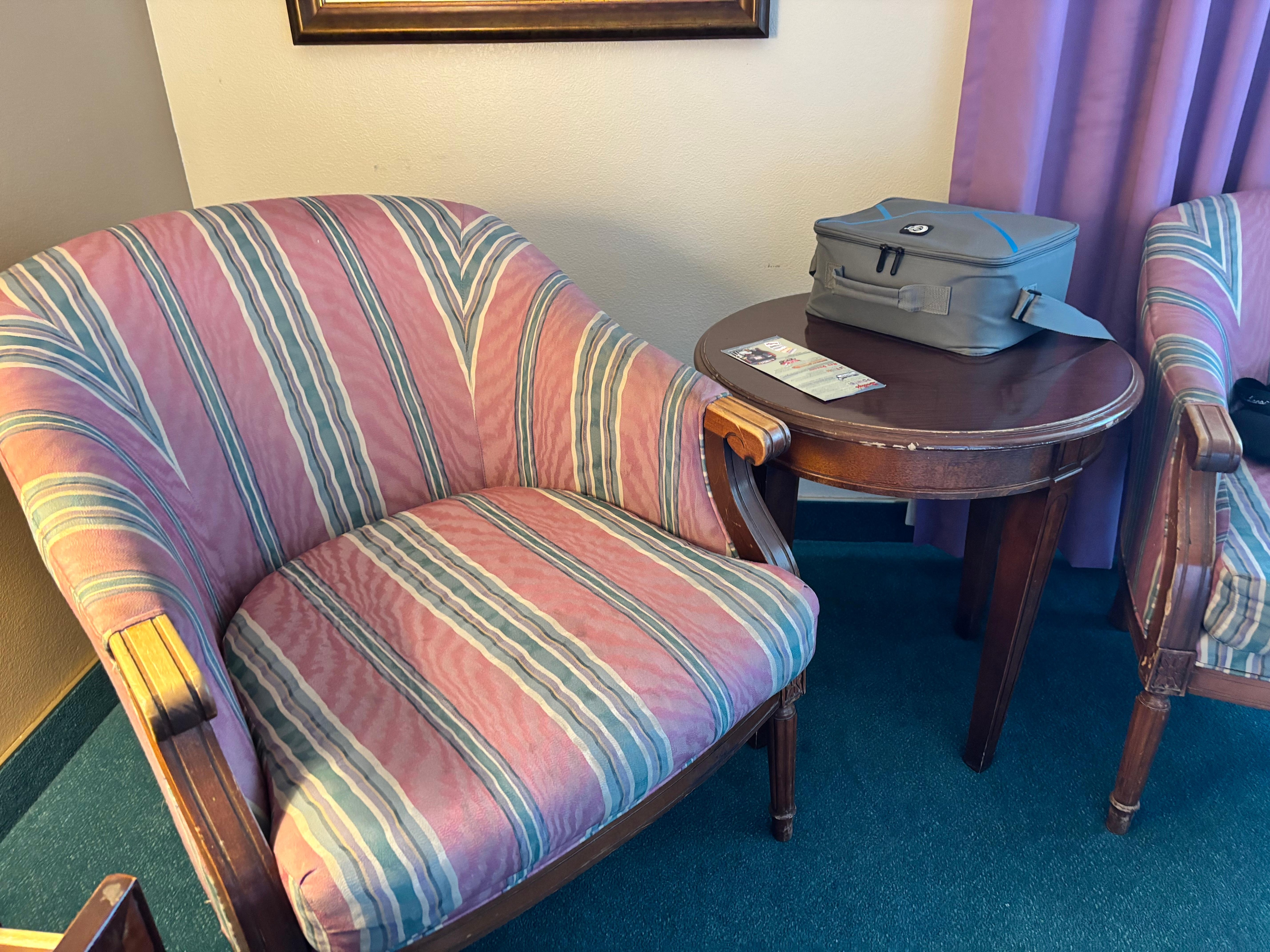 Looks like a dog had chewed on the arm rest