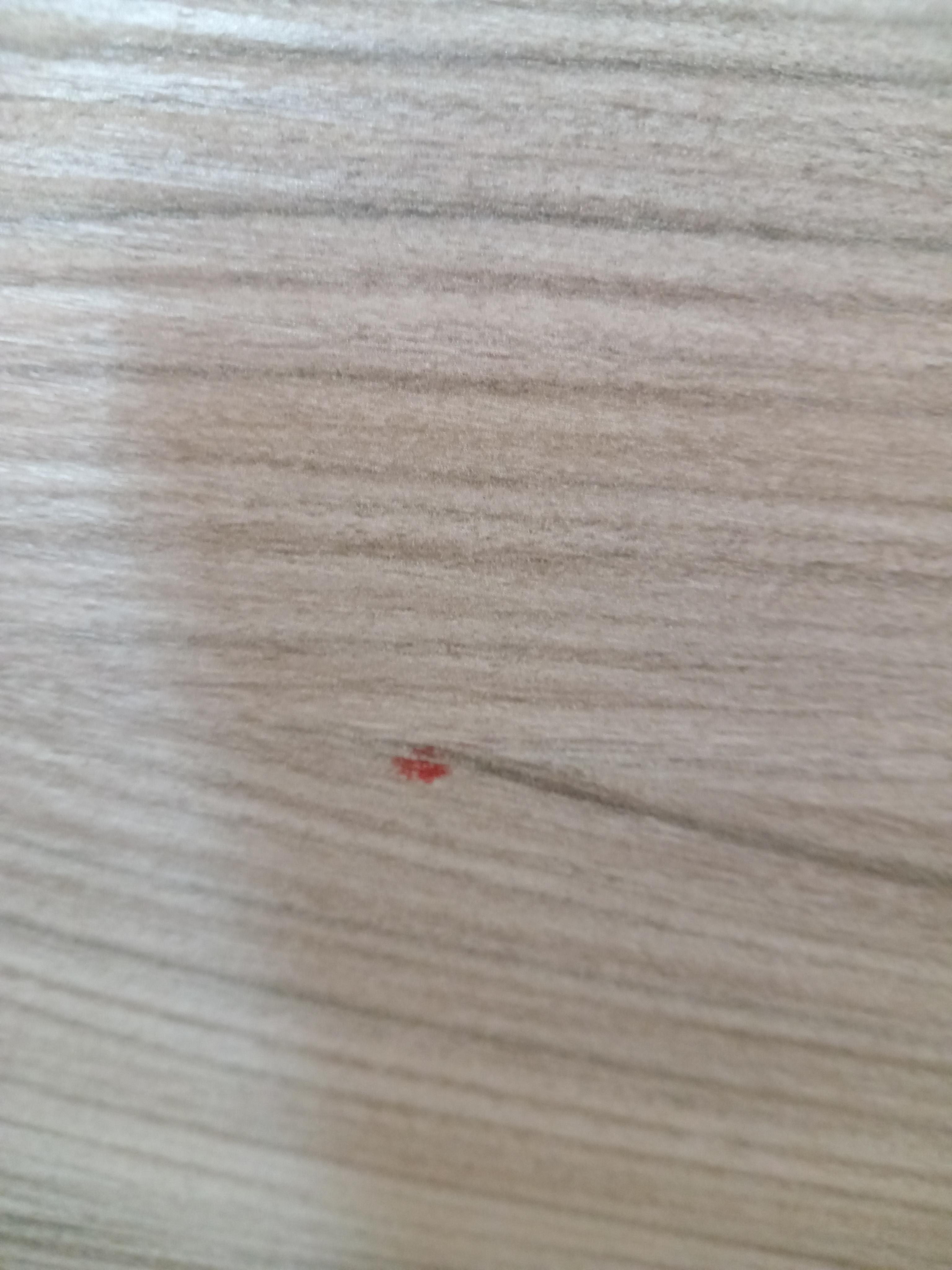 Blood stain on surfaces near headboard