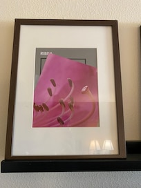 The picture in the frame had slid down and nobody noticed or bothered to fix it.