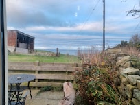 Seat out back with a cuppa and look out to sea