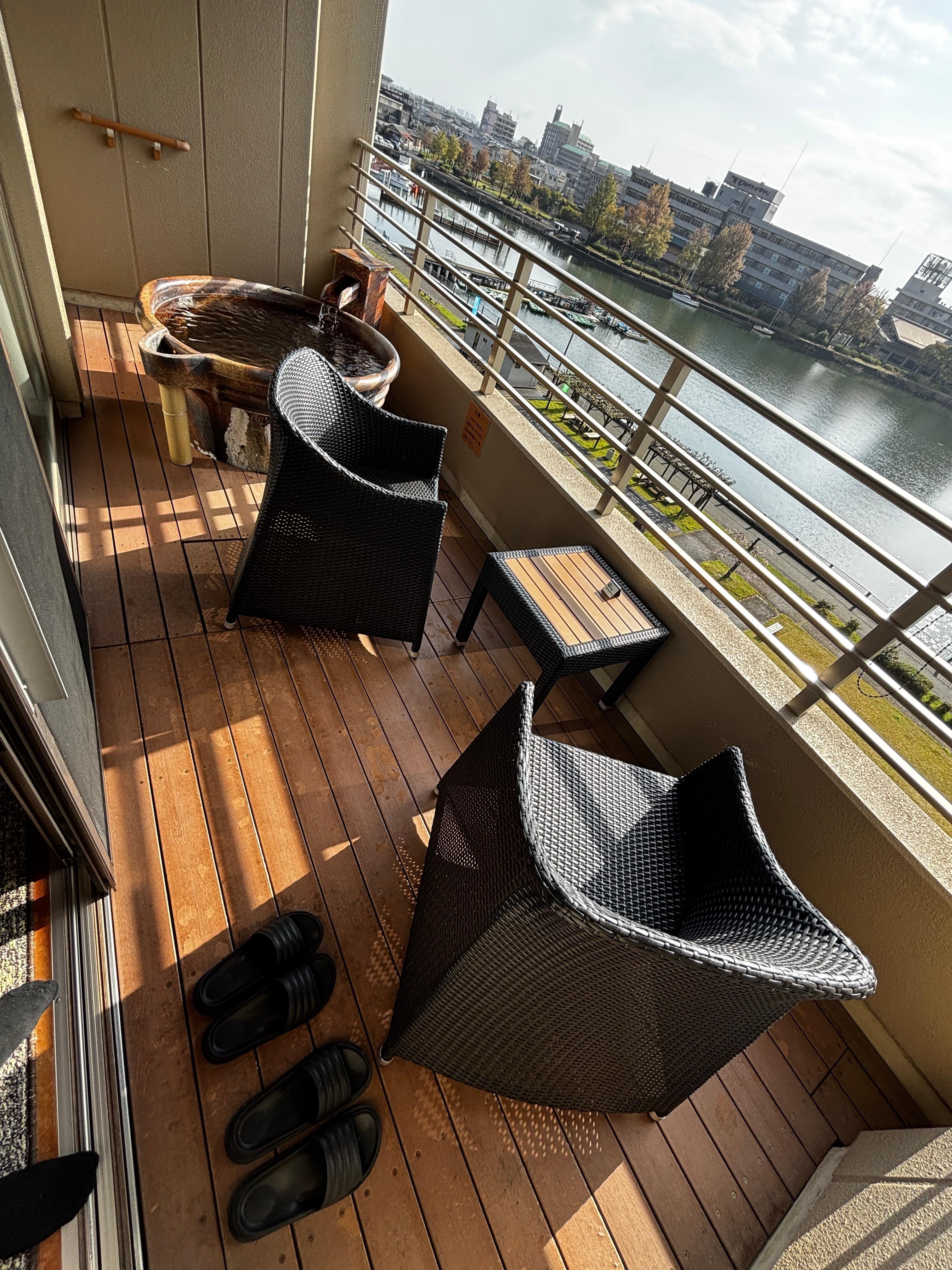 The balcony with private bath. There are roller blinds for privacy.