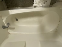 Moldy caulking around tub