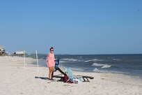 My beautiful granddaughter loves the beach.