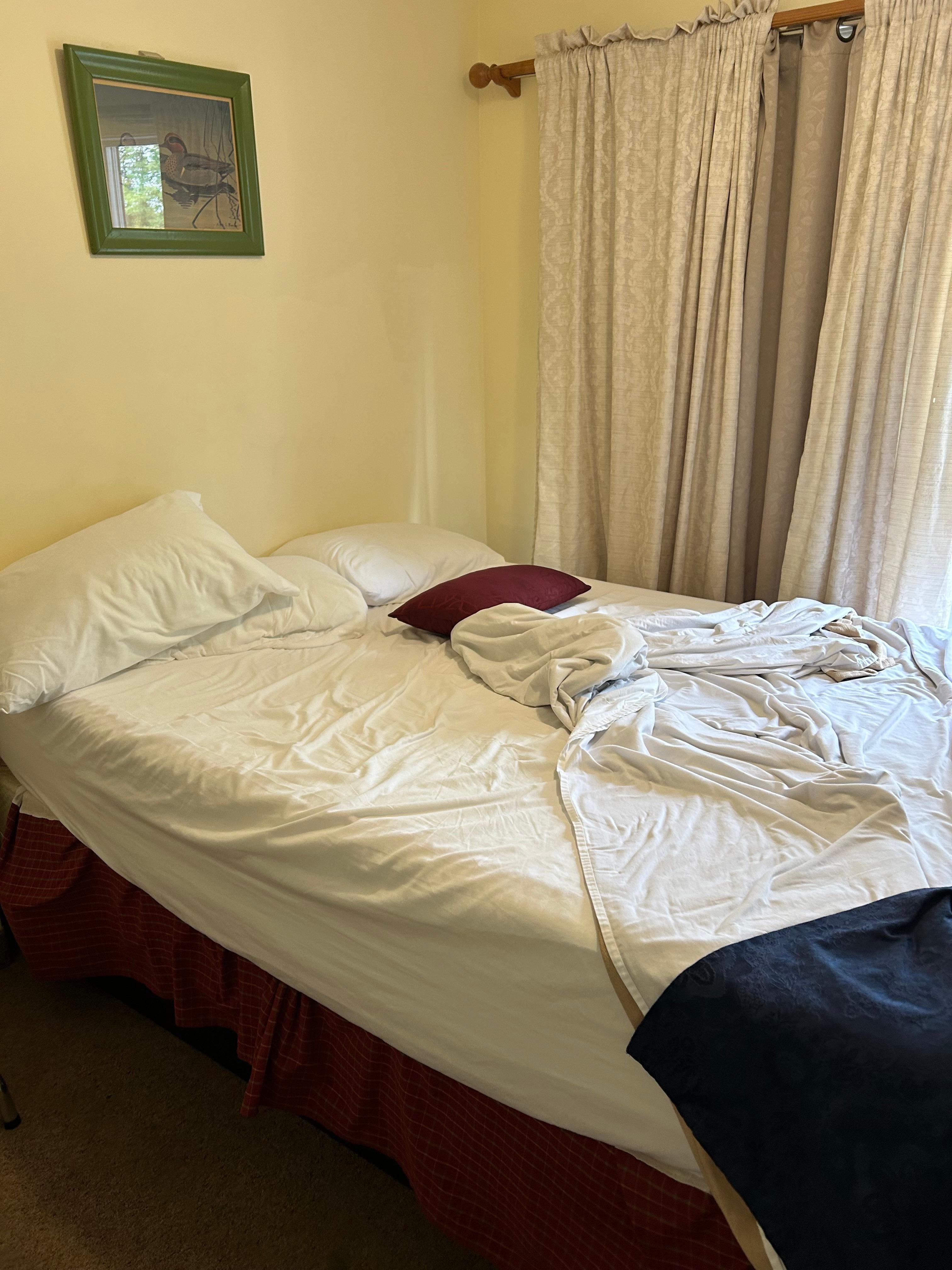 Couldn’t get in the bed because it was up against the sliding glass door on the other side