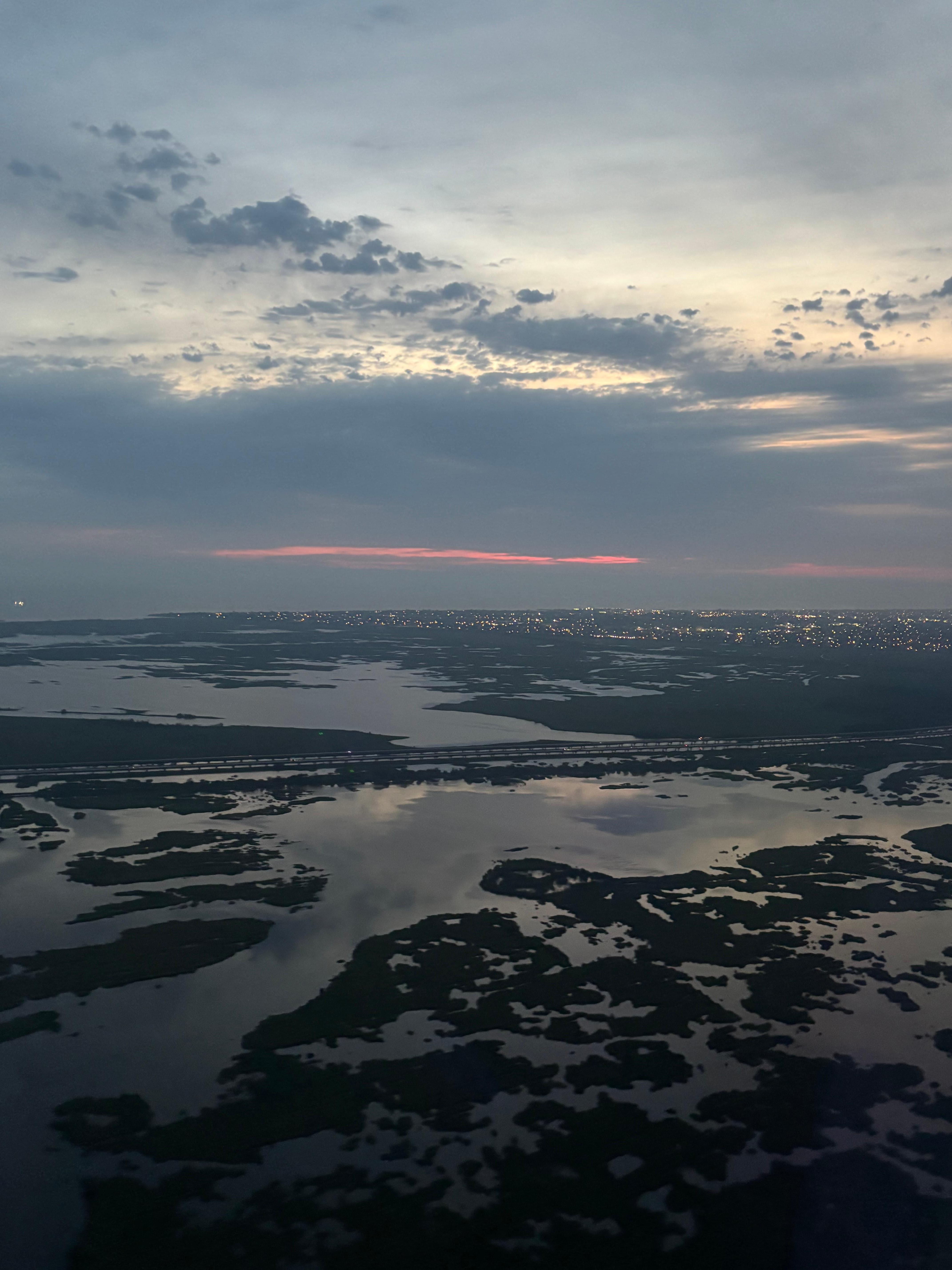 Sunrise over the bayou on our red-eye flight in