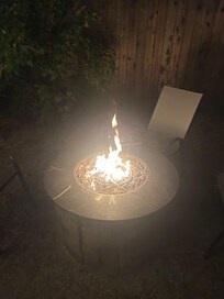 Propane fire pit in the backyard