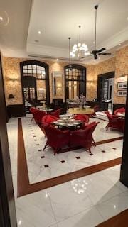 Breakfast / dining room. Probably 20ft ceilings