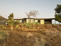 Het huis bij zonsopgang